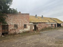 Здание 423,9 кв.м. и земельный участок 1250+/- 12 кв.м. в Астраханской обл.