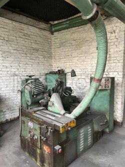 Полуавтомат для заточки фрезерных головок 3Б667 