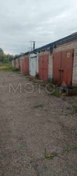 Гараж 18,7 кв.м. и 3677/422200 доли земельного участка в Томске 