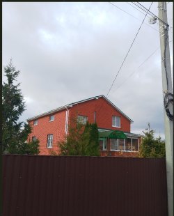 Жилой дом и земельный участок