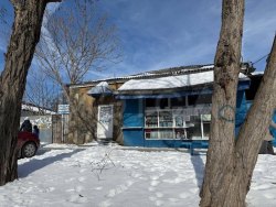 5/162 доли помещения и 5/162 доли земельного участка в Таганроге 