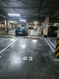 Помещение (машино-место №63), назначение: нежилое, площадью 18,4 кв. м, этаж: -1, кадастровый номер…