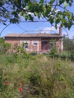 Земельный участок 1412 кв.м, дом 113 кв.м и хоз.постройки в Ростовской обл. 