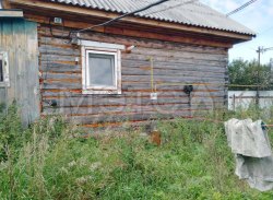 Дом 32,6 кв.м. и земельный участок 2083 кв.м. в Тюменской обл. 